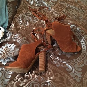 Cutout lace up tan booties